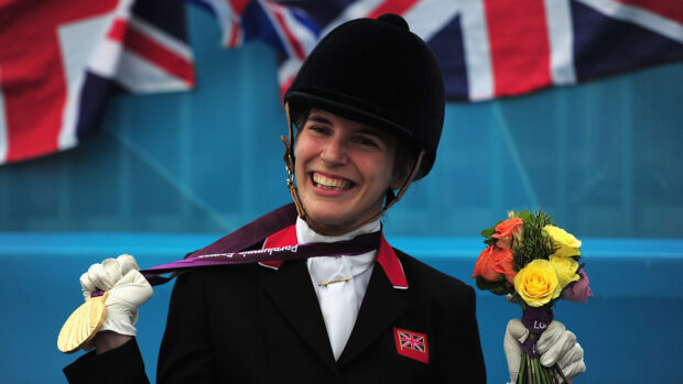 Sophie Christiansen holds her individual freestyle gold medal at the London Paralympics.