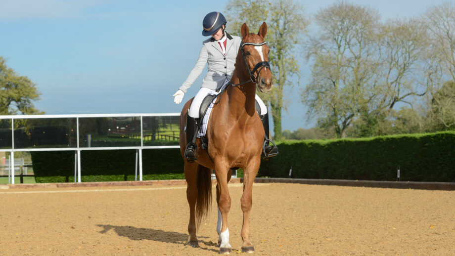 Rider wearing a smart show jacket for dressage test