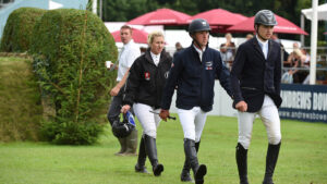Three riders walking the course at Hickstead
