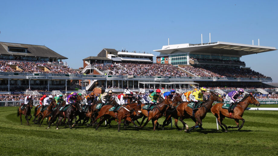 General view of horses running in the Grand National at Aintree Racecourse