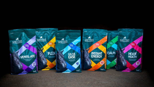 The new Spillers range of equine supplements in in a line against a dark background
