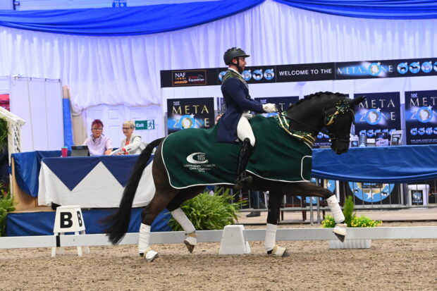 Davy Harvey and Diamond Blue win the Superflex inter I gold at the NAF Five Star Winter Dressage Championships.
