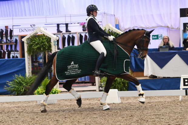 Carmen Gammie and Let’s Make An Opera M claimed the Spillers medium freestyle silver at the NAF Five Star Winter Dressage Championships