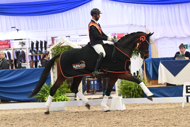 Dannie Morgan riding Vive La Reinne VH wins the Nupafeed advanced medium freestyle gold at the NAF Five Star Winter Dressage Championships.