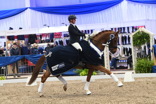 Sadie Smith and Times Oddjob win the Equi-Trek elementary gold at the NAF Five Star Winter Dressage Championships
