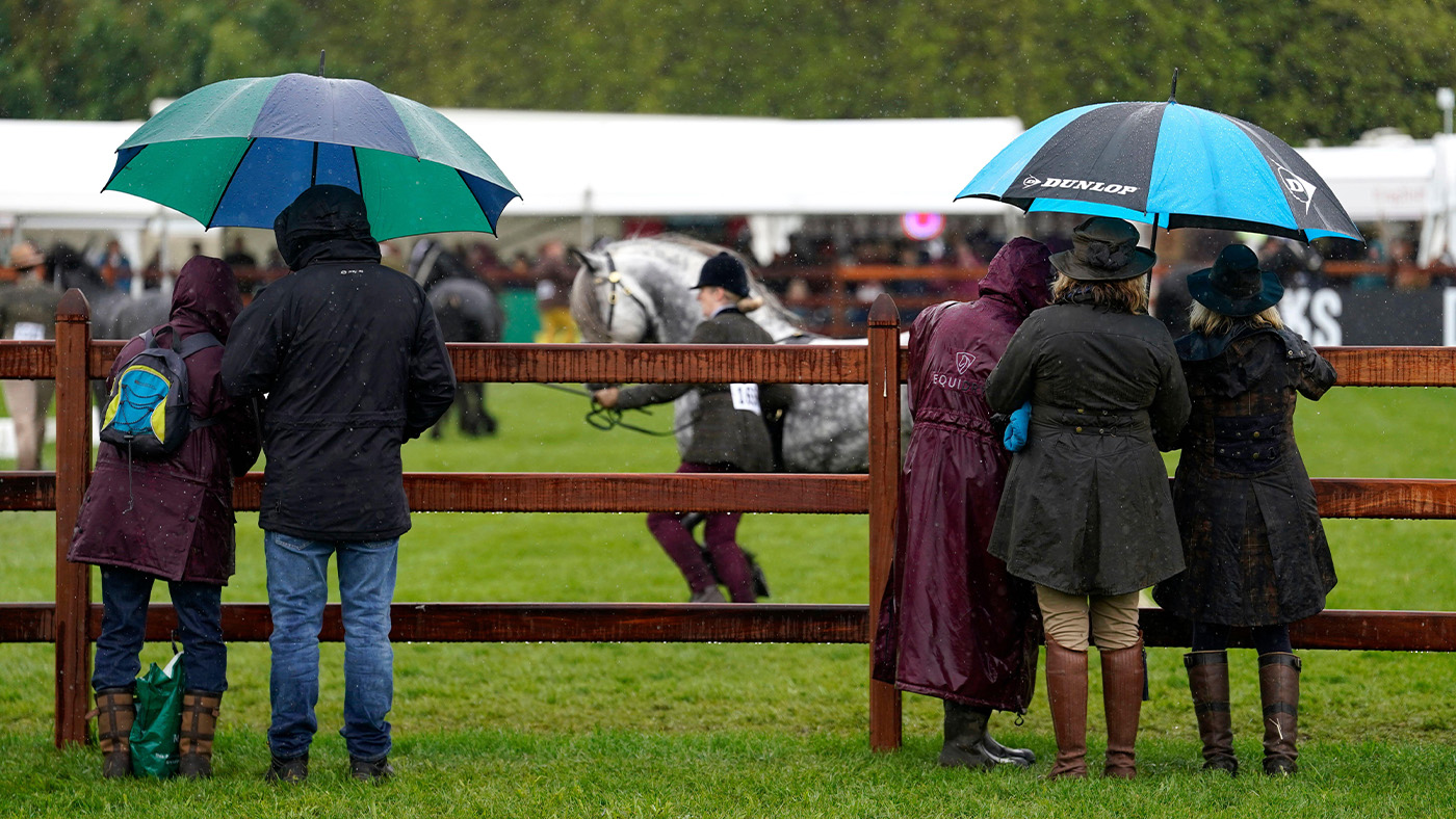 Spectators in the rain at Royal Windsor Horse Show
