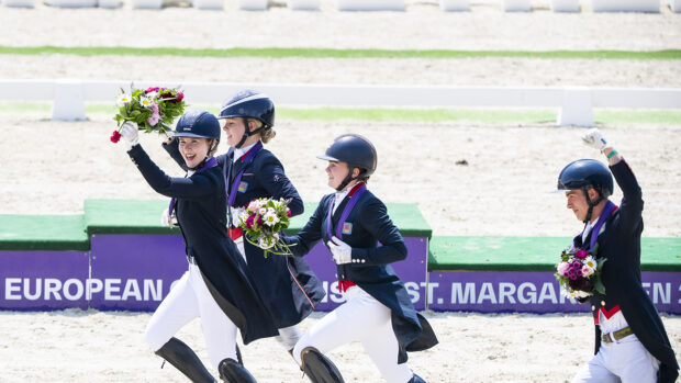 British young rider dressage squad celebrate their medals.