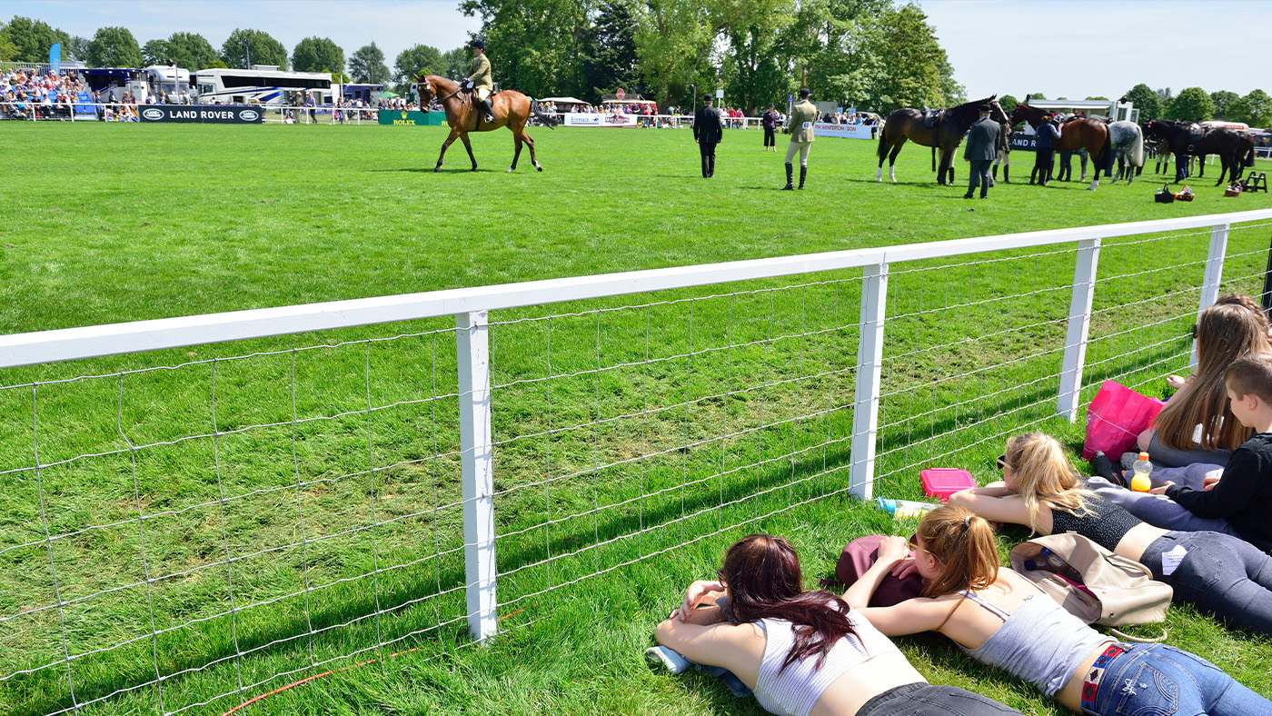 Spectators watching showing class at Royal Windsor Horse Show