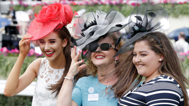 Three female racegoers at Royal Ascot