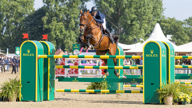 Gregory Wathelet and Bond Jamesbond de Hay clear the Rolex oxer on their way to winning the CSI5* Rolex Grand Prix at Royal Windsor Horse Show