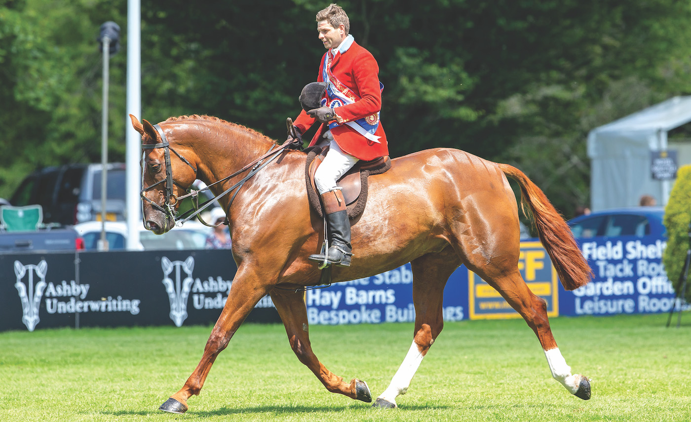 Craig Kiddier and Mulberry Lane winning supreme at Royal international Horse Show