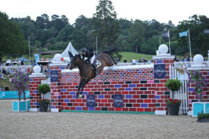 Teenager Rachel Proudley and Easy Boy De Laubry Z clear 7ft 3in to share the Bolesworth puissance spoils with Brendan Murphy riding Erne Riverrun.
