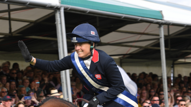 Pippa Funnell, pictured wearing a Champion helmet, winning Burghley in 2019.