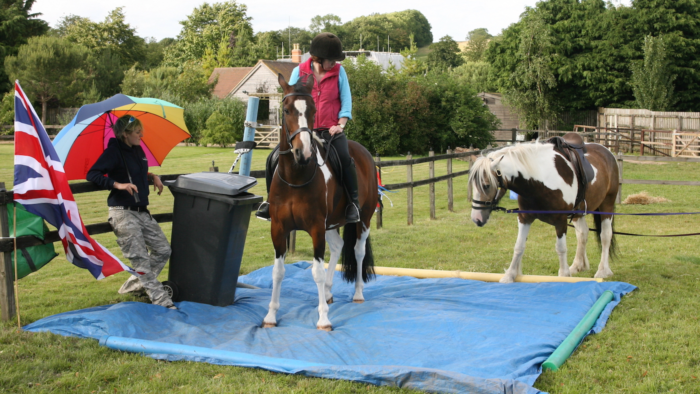 Kelly Marks demonstrating groundwork exercises to help a spooky horse