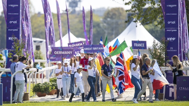 Teams carry flags during the opening ceremony of the Milan Europeans in 2023.
