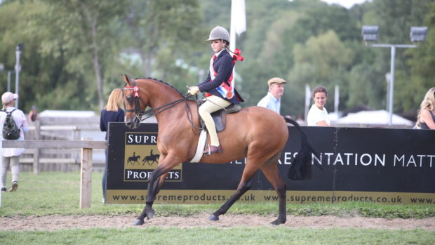 Livie Smith and Swanlow Time To Shine lifts the part bred championship for Team Jinks