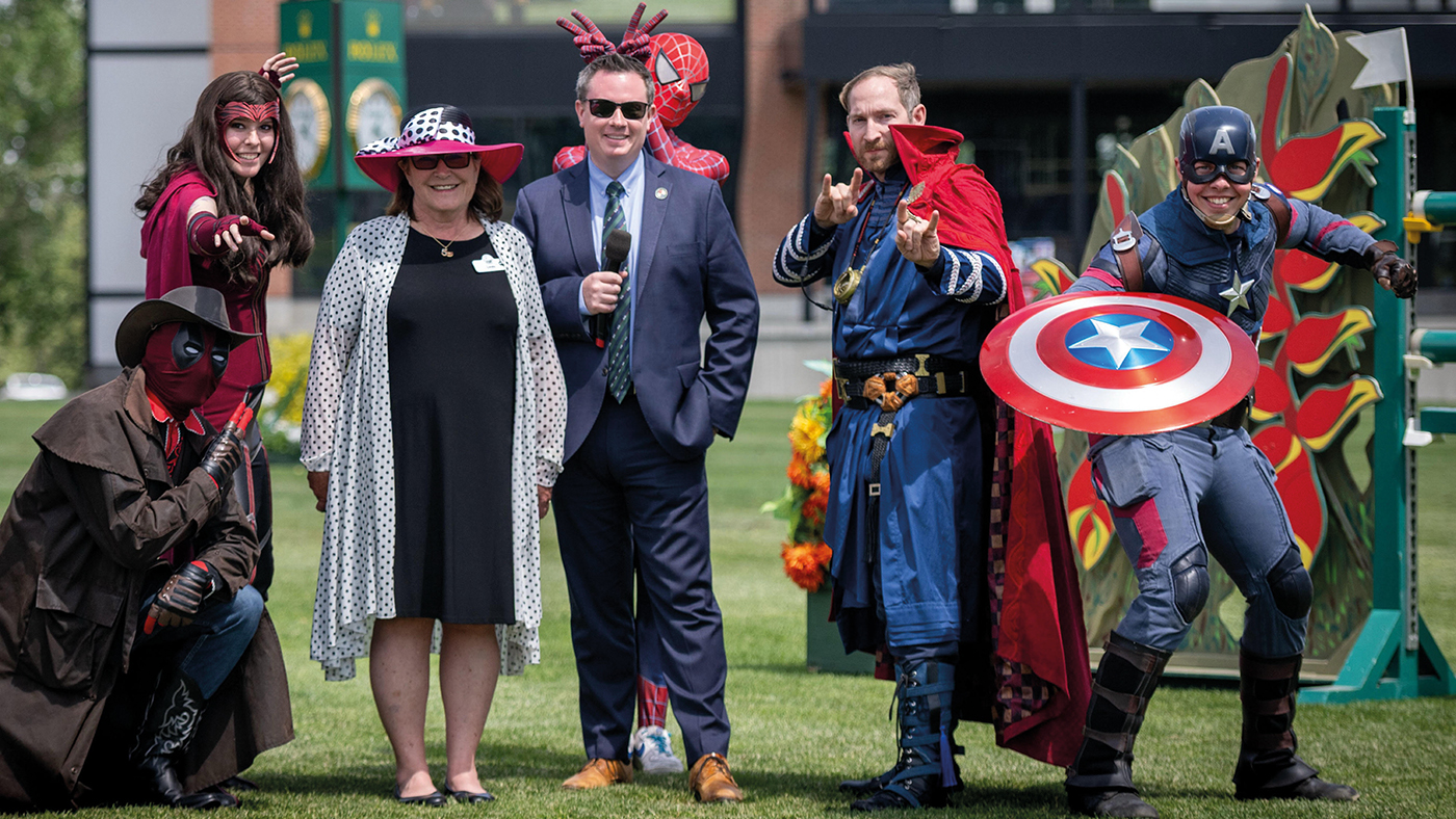 Marvel characters join Spruce Meadows president Linda Southern-Heathcott and commentator Adam Cromarty at Spruce Meadows.