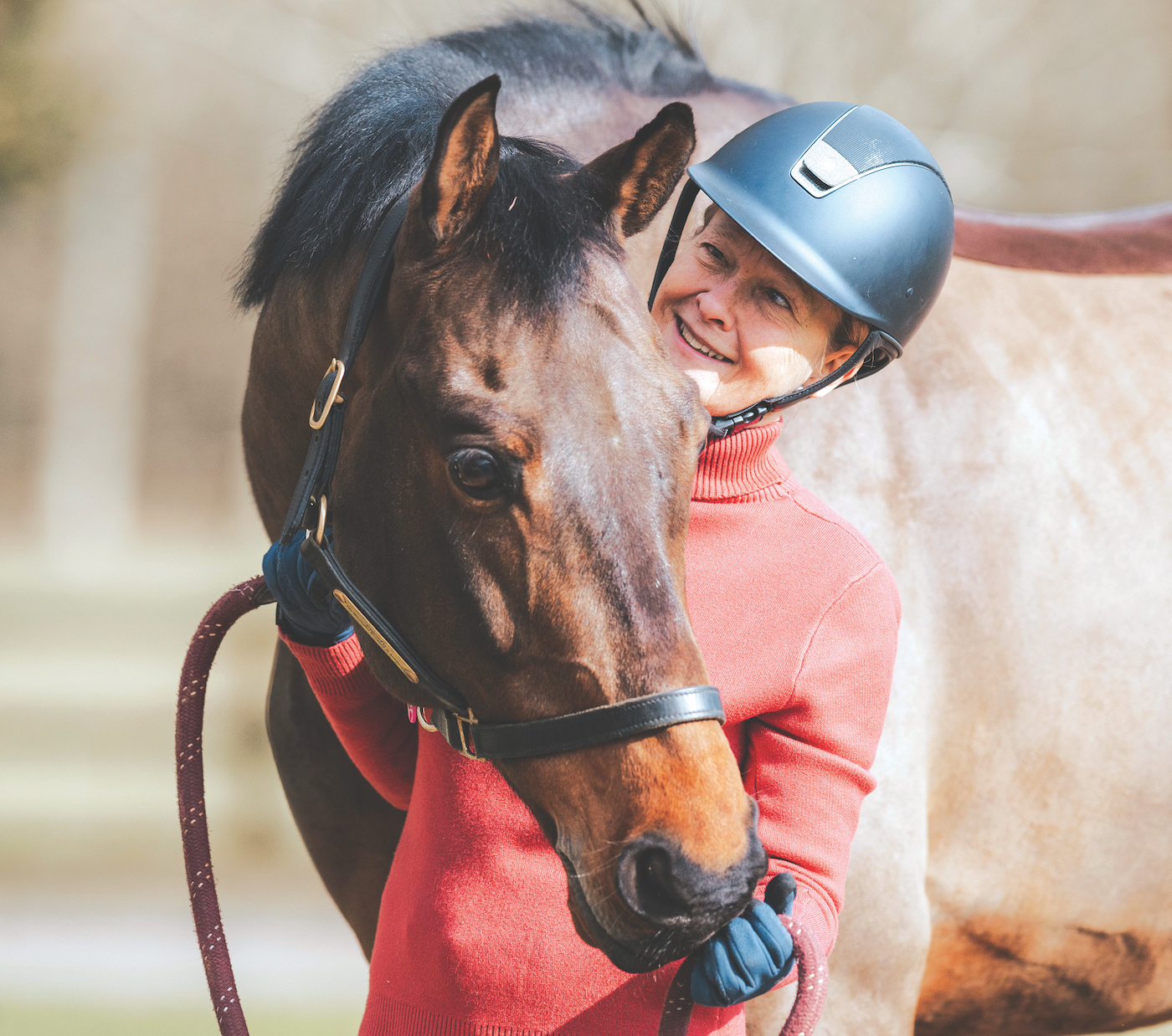 Woman with horse, close-up