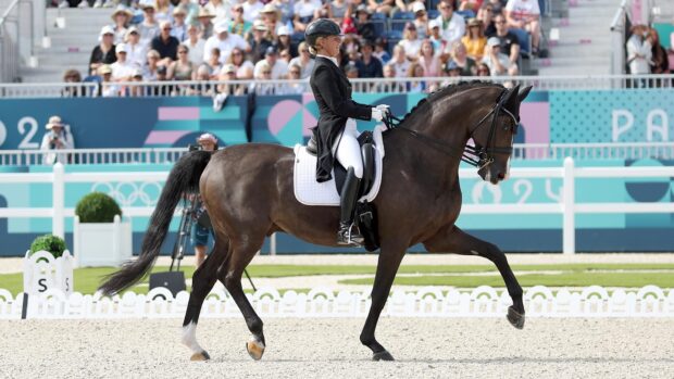ERSAILLES, FRANCE - AUGUST 04: Victoria Max-Theurer and horse Abegglen FH NRW of Team Austria compete in the Dressage Individual Grand Prix Freestyle on day nine of the Olympic Games Paris 2024 at Chateau de Versailles on August 04, 2024 in Versailles, France. (Photo by Maja Hitij/Getty Images)