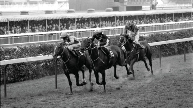 Flat jockey and racing managed Bruce Raymond pictured on Fiery Fingers at Happy Valley, alongside Tony Cruz and Ray Setches.