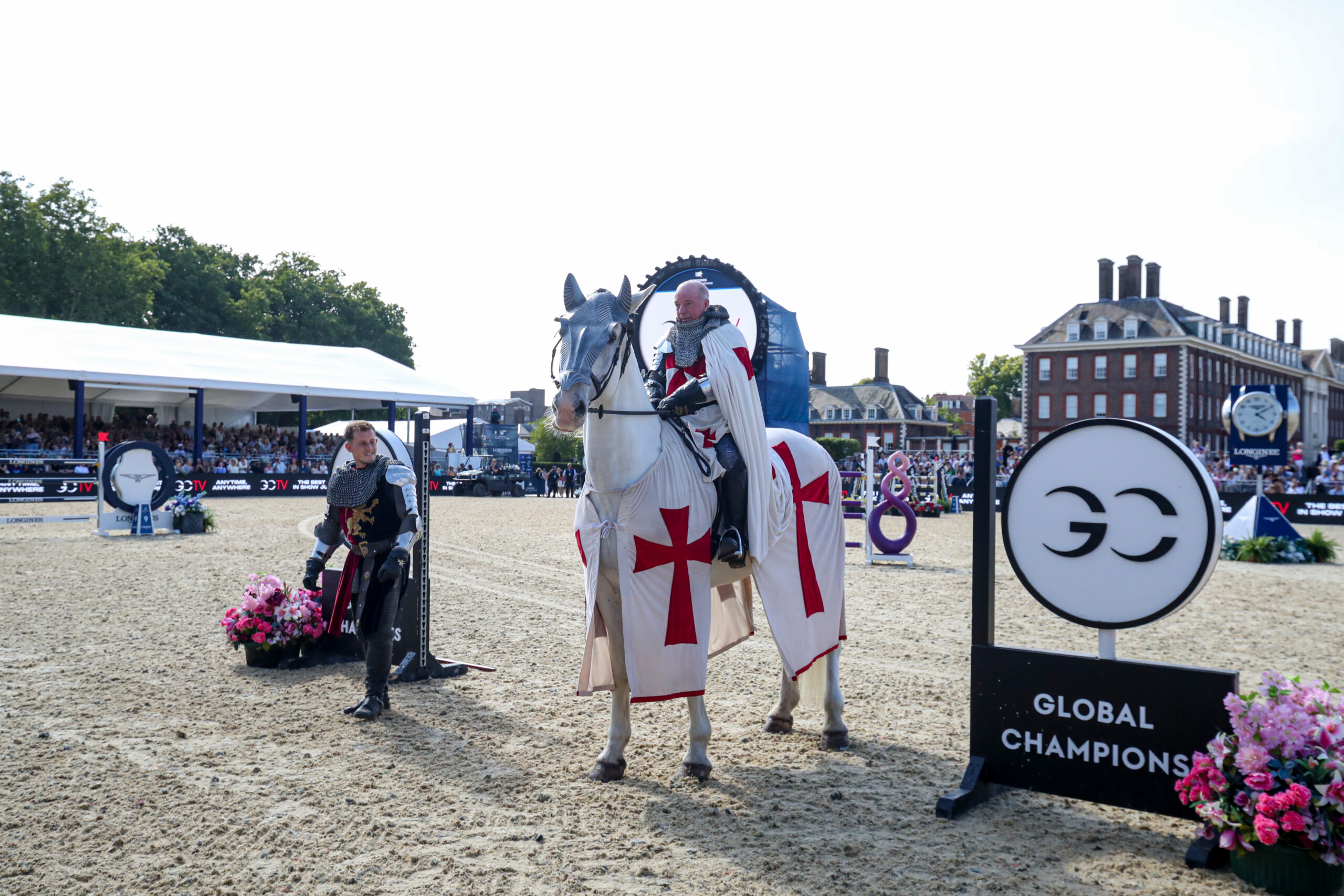 John Whitaker dressed as a knight in shining armour to celebrate his 70th birthday at the Longines Global Champions Tour of London 2025.