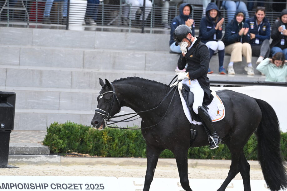 Justin Verboomen overwhelmed after winning gold in the grand prix special on Zonik Plus at the European Dressage Championships.