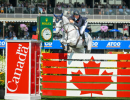 Matt Sampson and Ebolensky jumping for Great Britain in the BMO Nations Cup showjumping competition at Spruce Meadows, Canada.