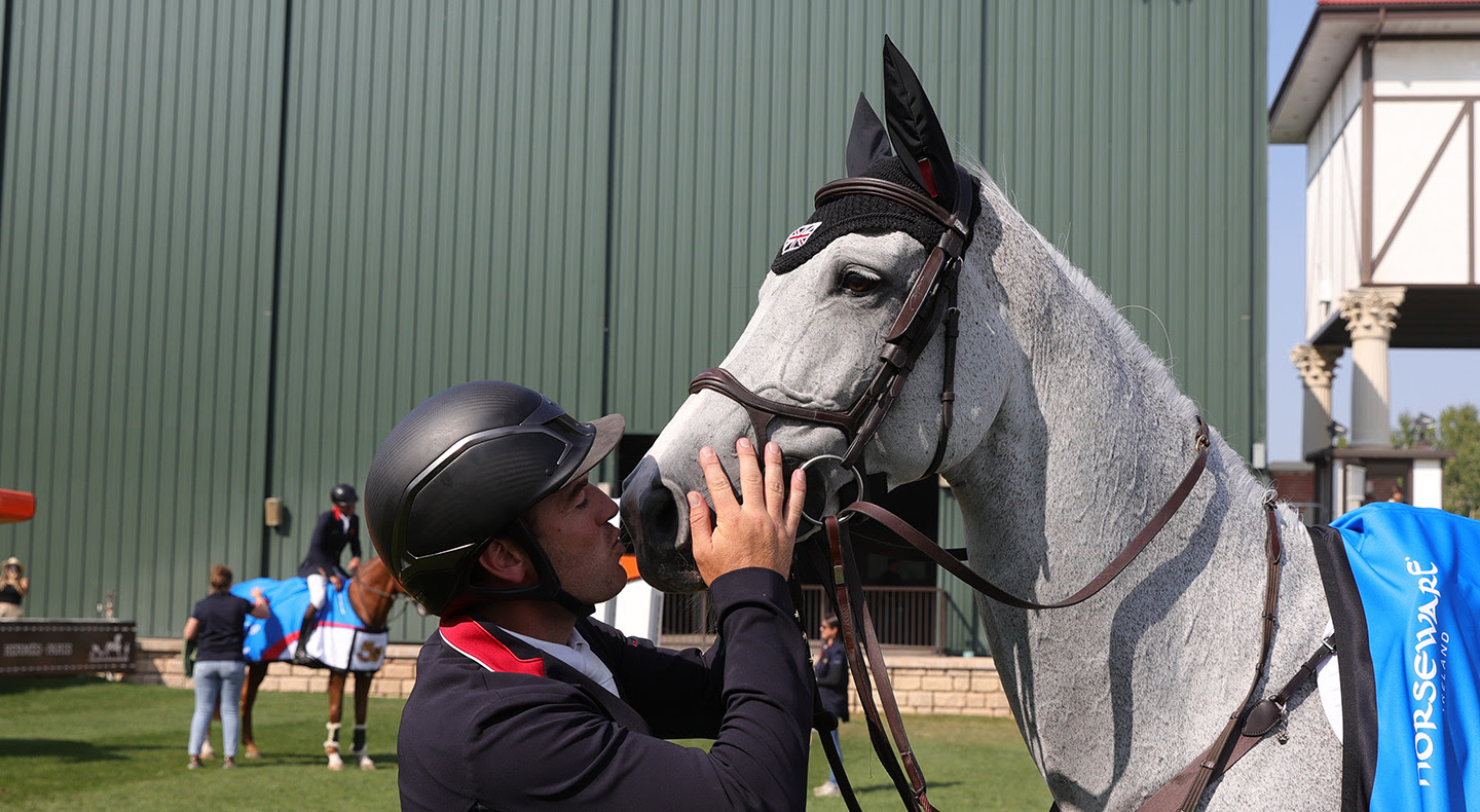 The brilliant Millfield Colette earns kisses from Donald Whitaker after jumping double clear for Great Britain in the BMO Nations Cup at Spruce Meadows, Canada.