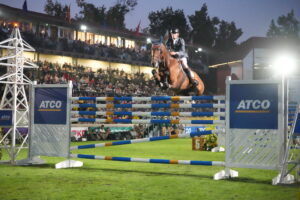 Joe Stockdale and It's Confidential clear 2.13m for a record-breaking win in the ATCO Electric Six Bar at the Spruce Meadows Masters in Canada.