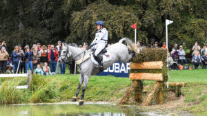 Bubby Upton jumps grey horse Its Cooley Time into the water over a narrow brush with a significant drop on landing at the Blenheim Europeans 2025.