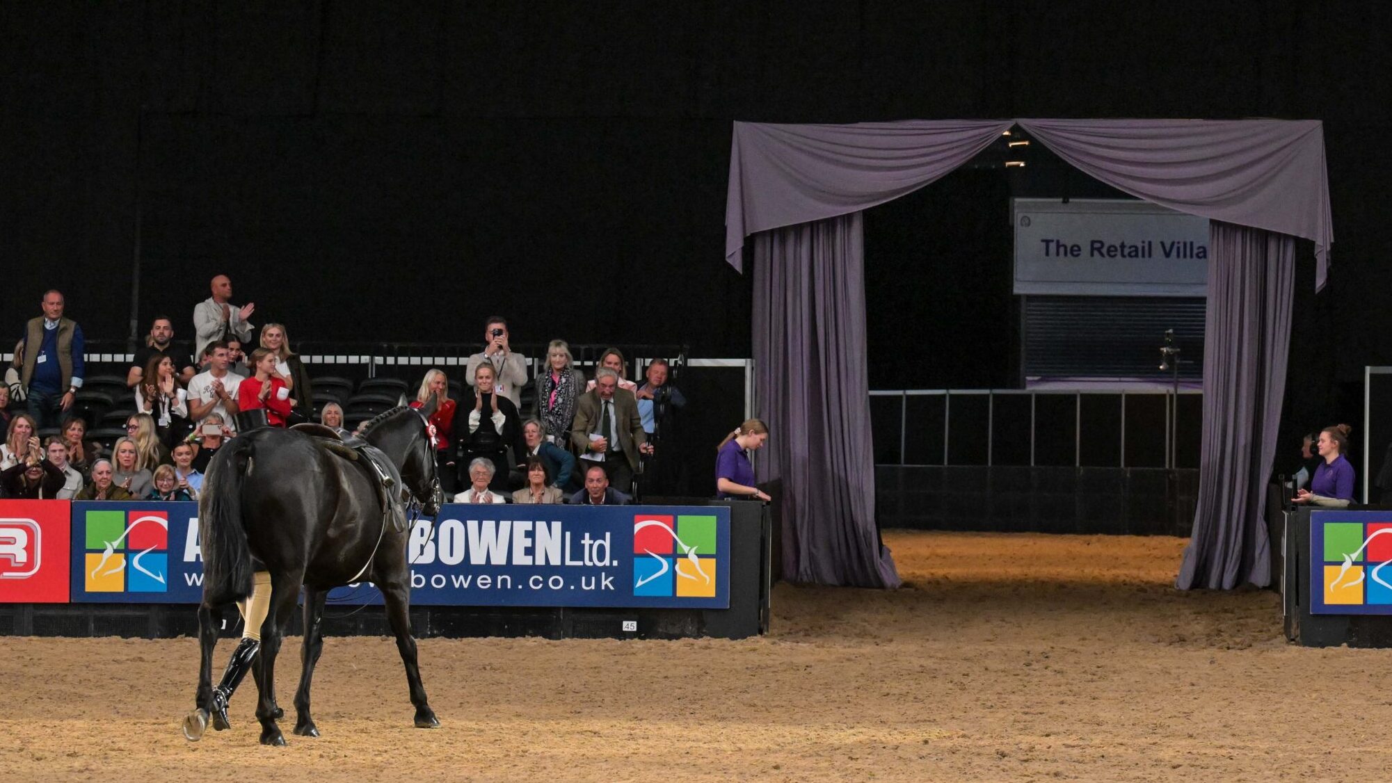 Forgeland Hyde Park and Isabella Mears Wood exit the arena after the prolific hack is retired at HOYS