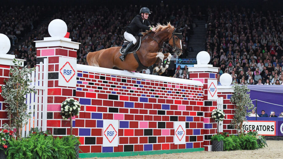 Joseph Trunkfield riding Senators Rhondaigo in the puissance competition at HOYS in 2021