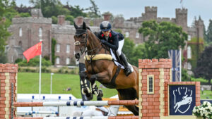 Laura Collett showjumping London 52 in front of the palace at Scone Palace Horse Trials in 2025