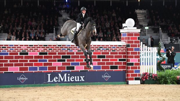Rachel Proudley and Easy Boy winning puissance at London