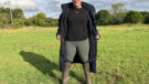 Lady wears Reincoat Lite, viewed from the front showing the coat unzipped