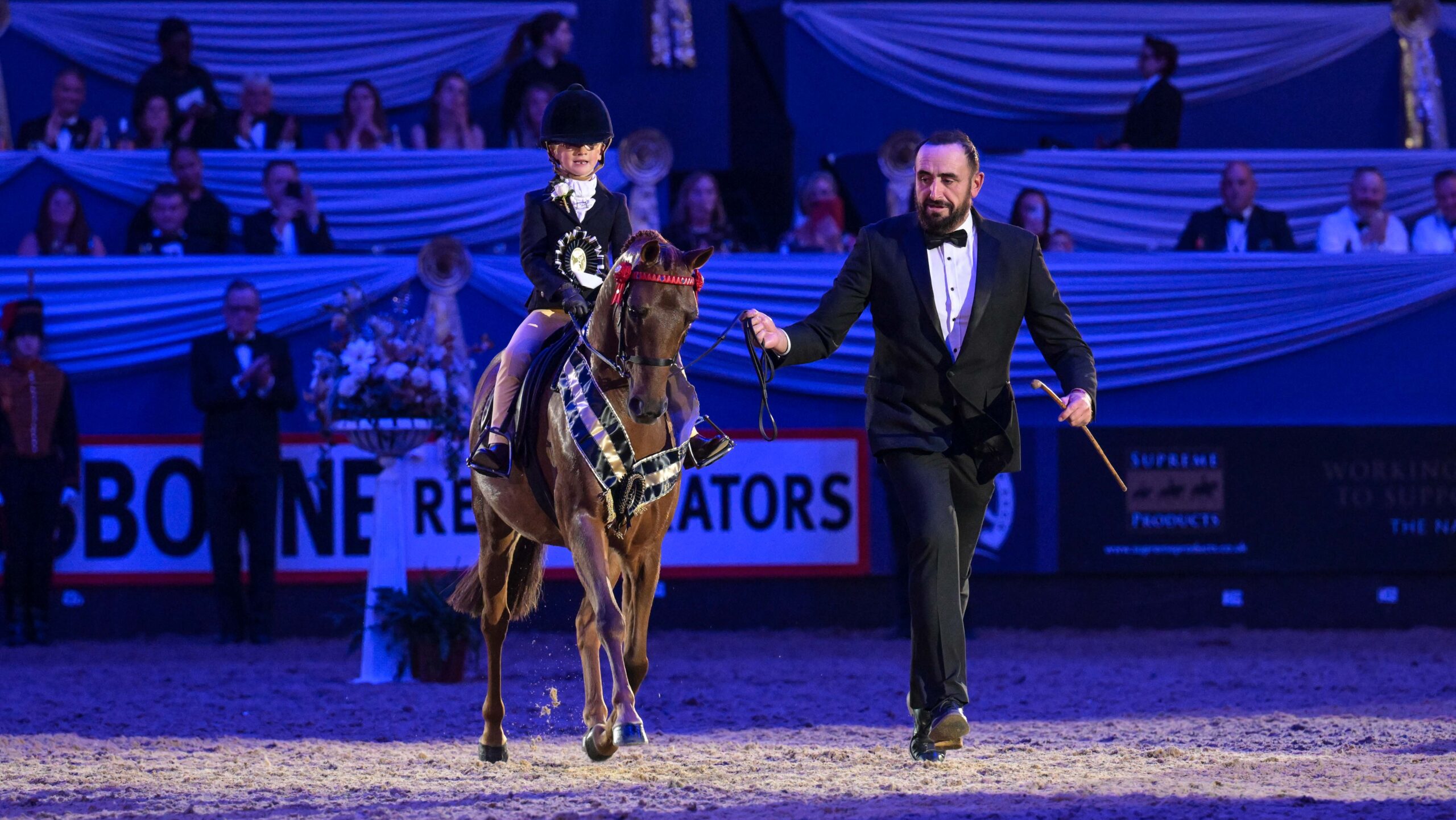 Elmswood Spring Parade, ridden by Florence Rendall and led by John Harvey.
