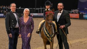 Elmswood Spring Parade and Florence Rendall are 2025 supreme champion pony at HOYS led by John Harvey.