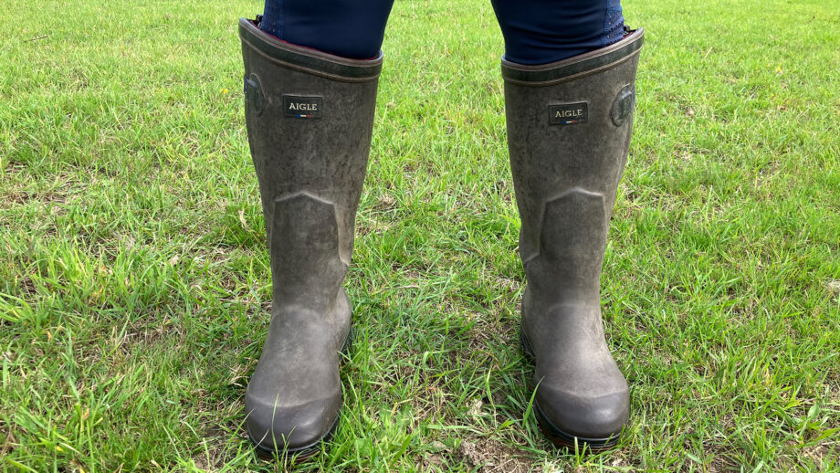 Close up of lady wearing Aigle wellies from the front
