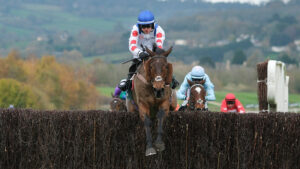 Freddie Gingell riding Il Ridoto clear the last to win The Paddy Power Gold Cup Handicap Chase at the Cheltenham November Meeting 2024