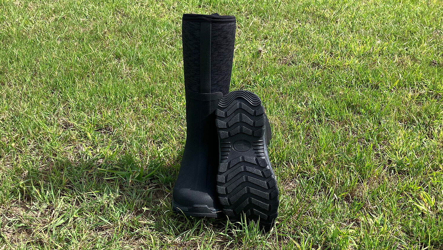 Harry Hall Mud Boots Neoprene Wellies front view in field one foot showing footbed