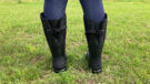 close up back view of model wearing Muck Boot Chore Adjustable Boots