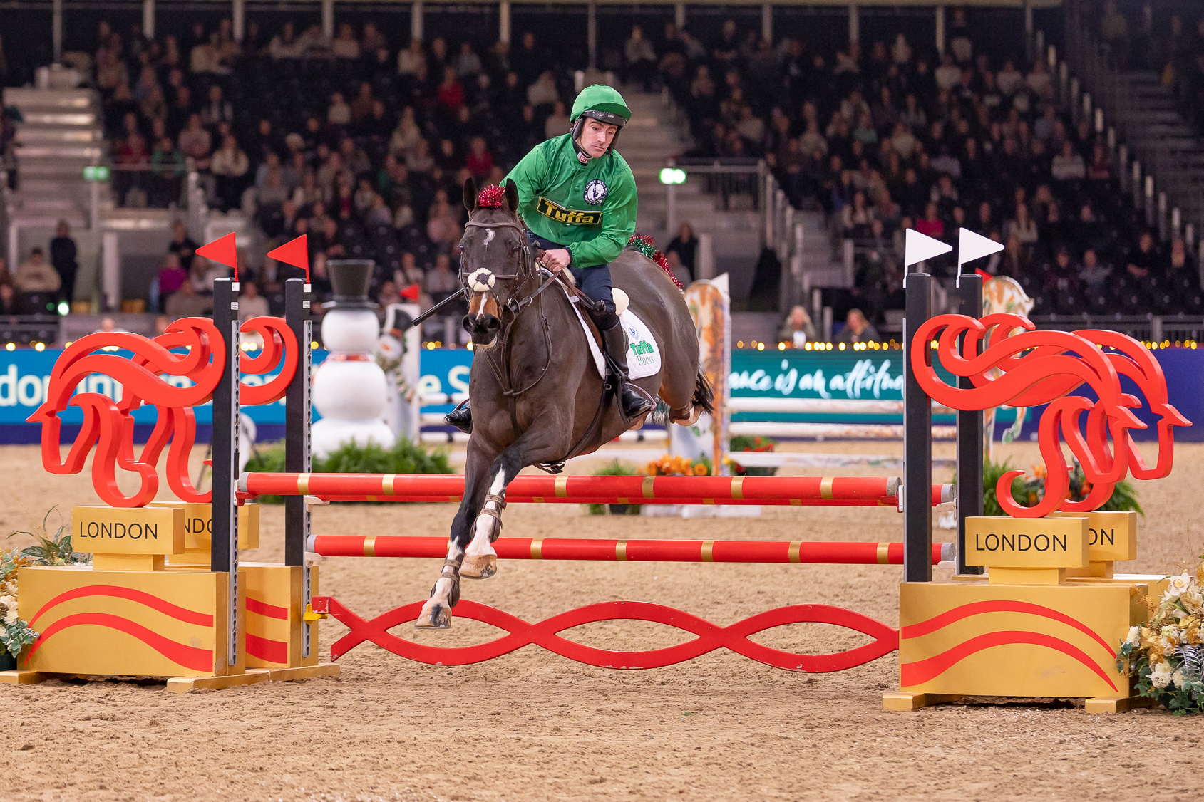 Former champion jump jockey Brian Hughes and his very own Nick Rockett scorch home with the fastest time of the eveing.
