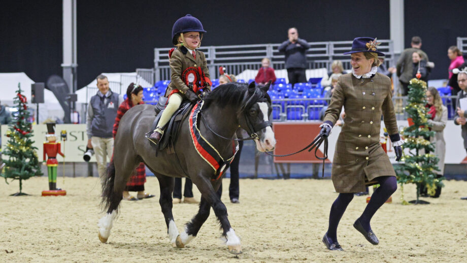 Gilfach Gareth and Emily Raeside, four, win the mountain and moorland lead rein final at the TSR Amateur of the Year championship show led by Ashley Raeside