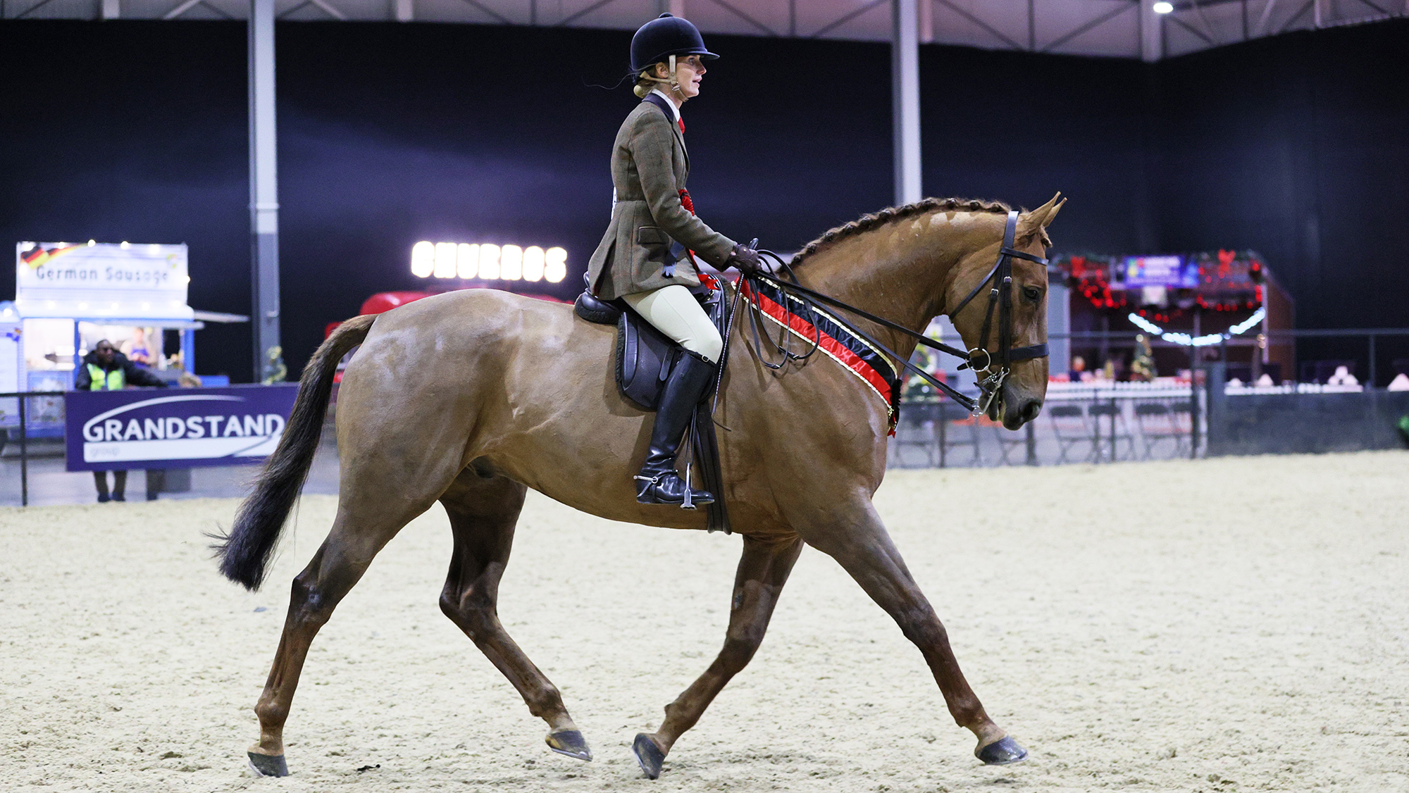 Camilla Stowell Davies and Glenkeernan Dance In The Deep trot out of the ring having won the hunter final