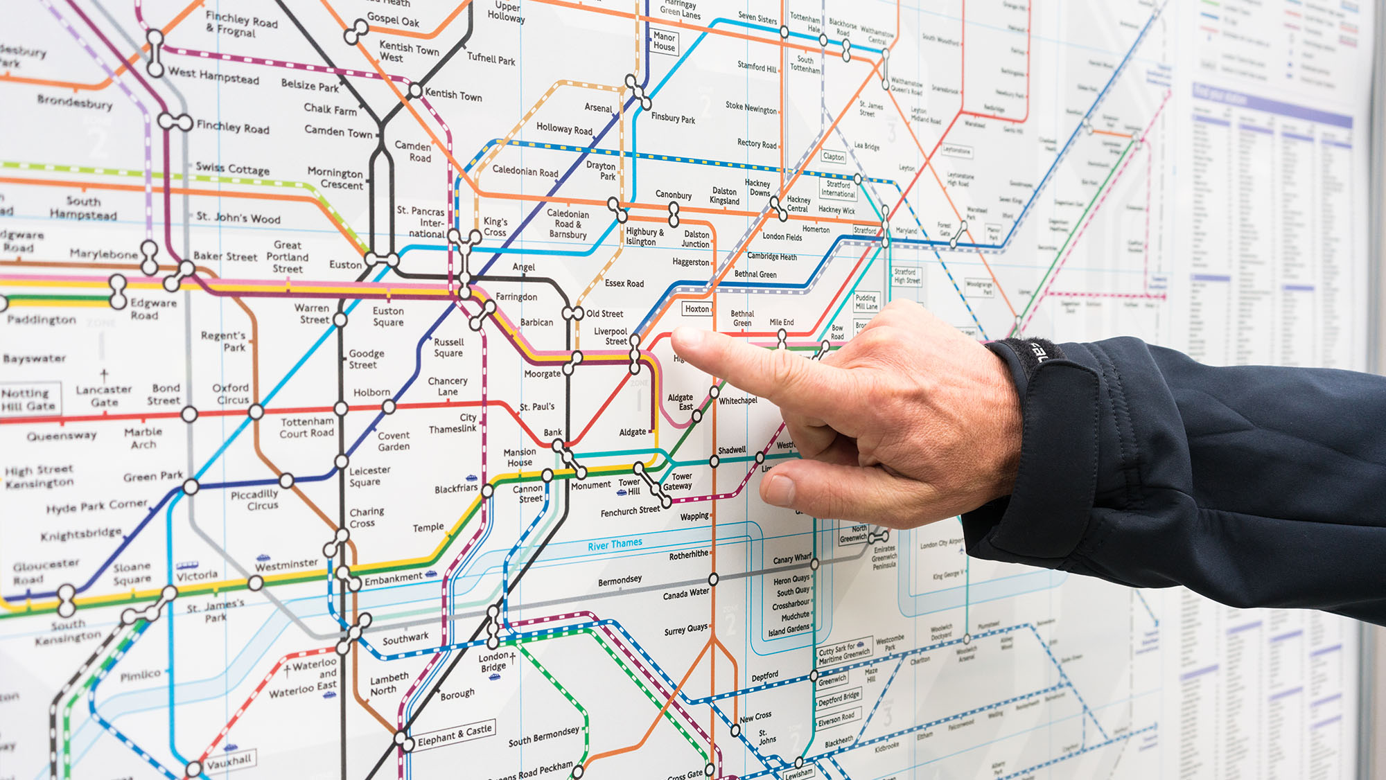 Arm pointing at the London Tube Map