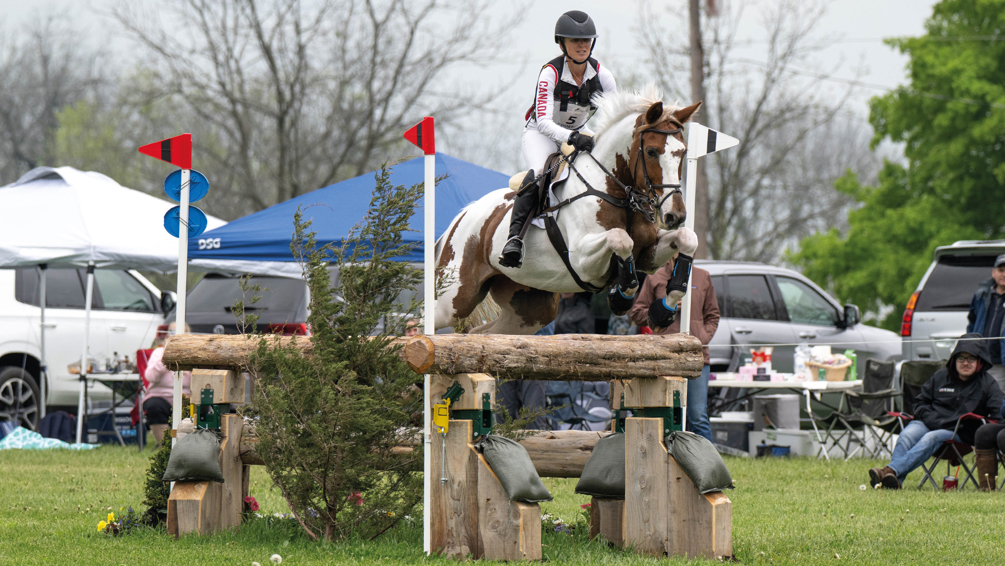 Jessica Phoenix rides Flurouscent Adolescent across country at Kentucky Three Day Event