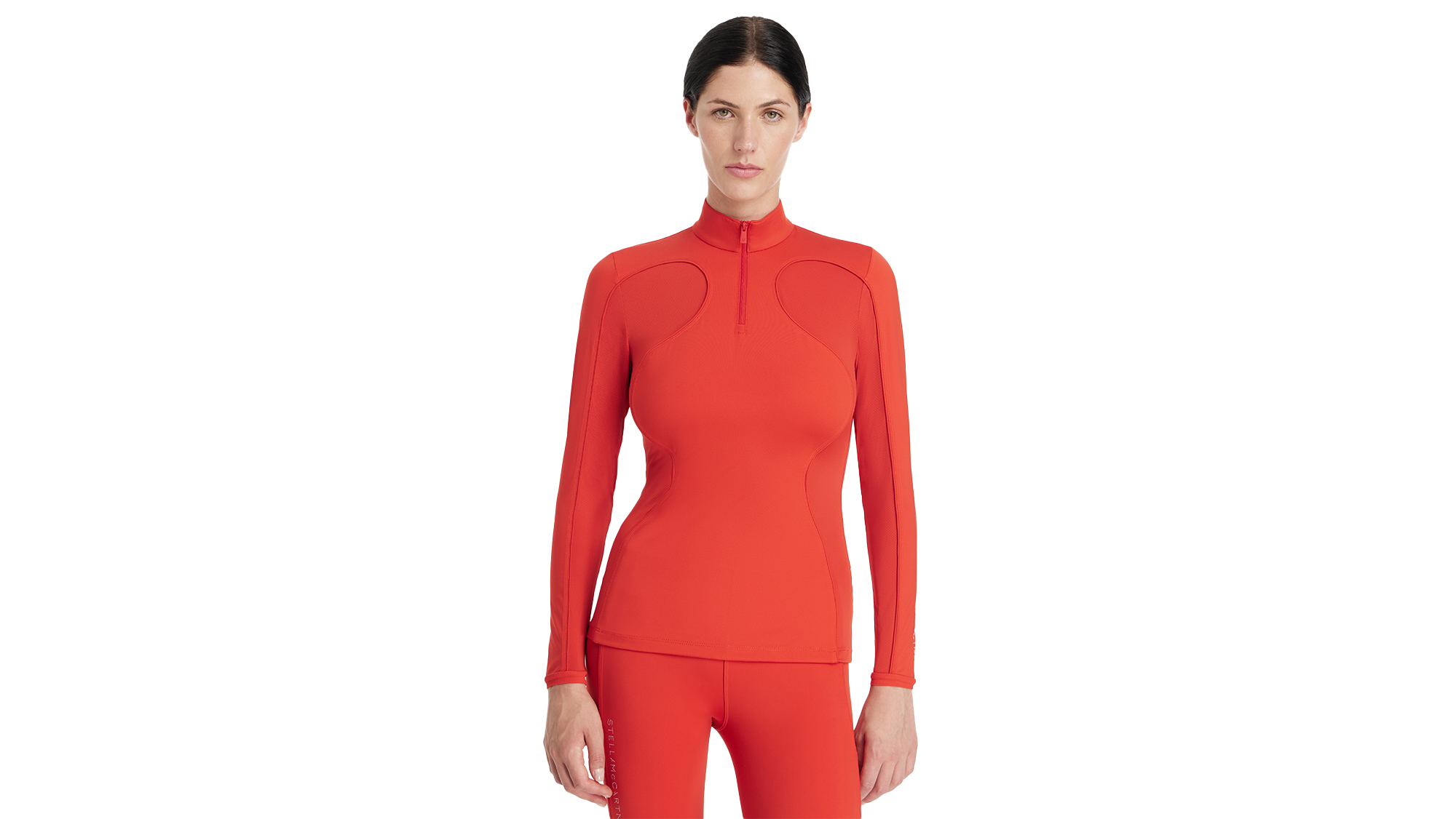 Model wearing LeMieux x Stella McCartney baselayer in Red