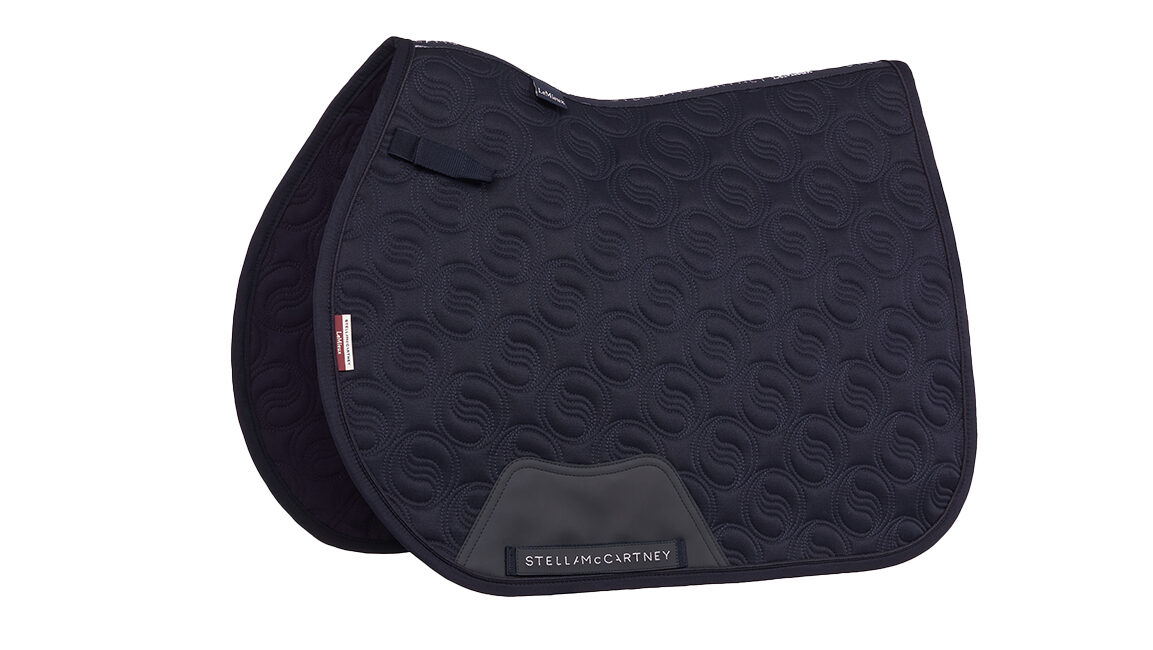 Studio image of navy LeMieux x Stella McCartney saddlepad