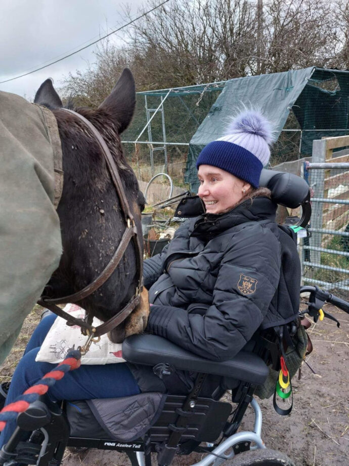 Pictured Gemma Potts and her former racehorse horse Optimal Spirit, known as Charlie.