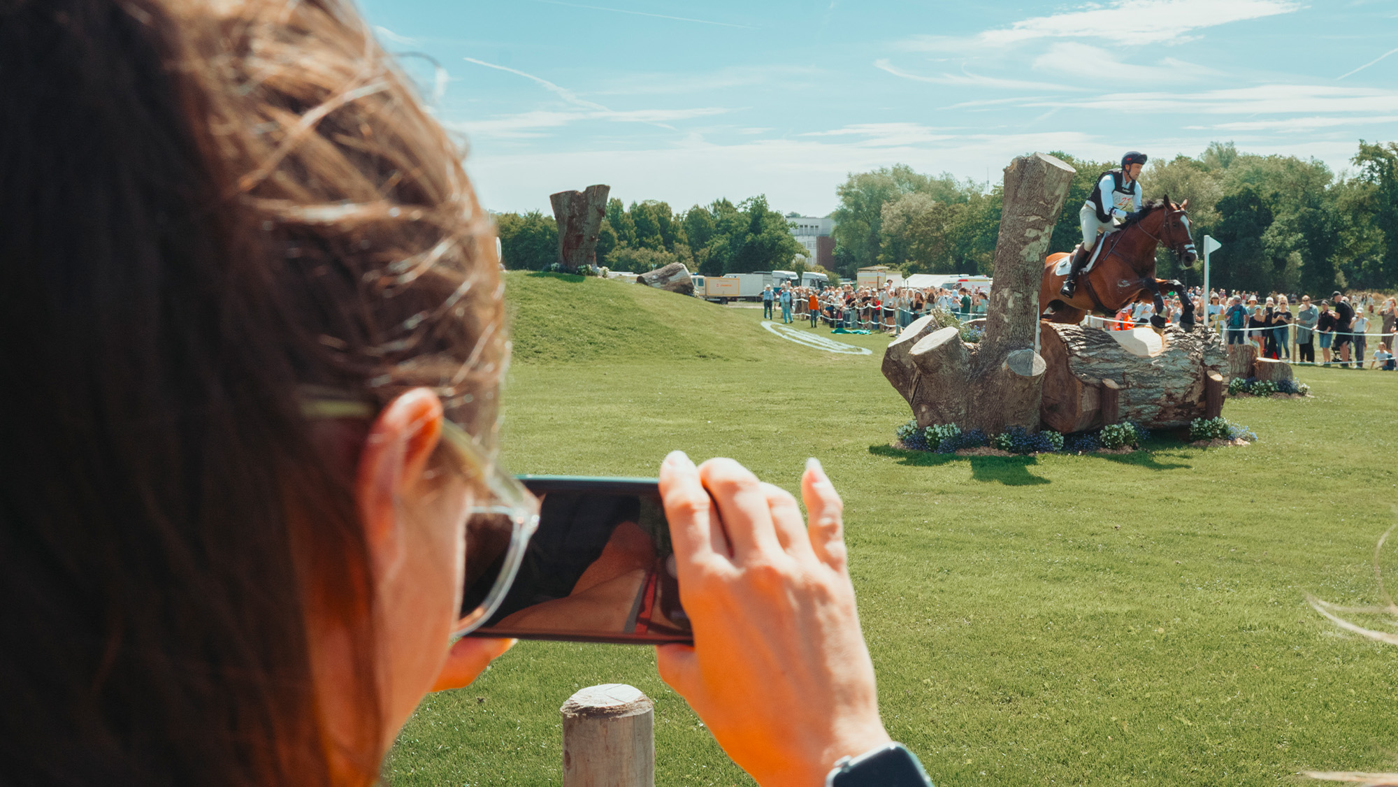Spectator photographing the cross-country event at Aachen
